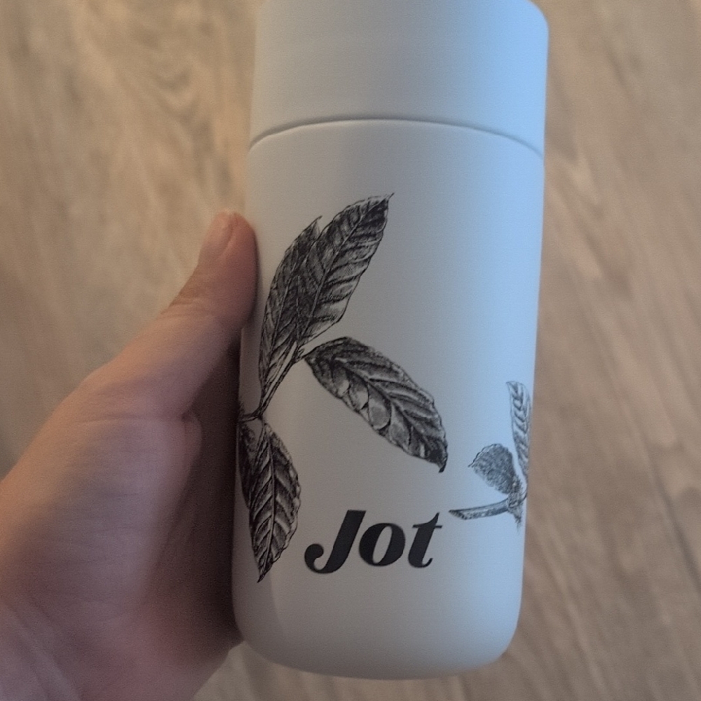 White Travel Mug with Leaf Design